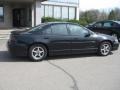 2002 Black Pontiac Grand Prix GT Sedan  photo #2