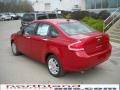 2010 Sangria Red Metallic Ford Focus SEL Sedan  photo #8