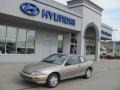 Sandrift Metallic 1997 Chevrolet Cavalier Coupe