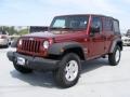 2009 Red Rock Crystal Pearl Jeep Wrangler Unlimited X 4x4  photo #1