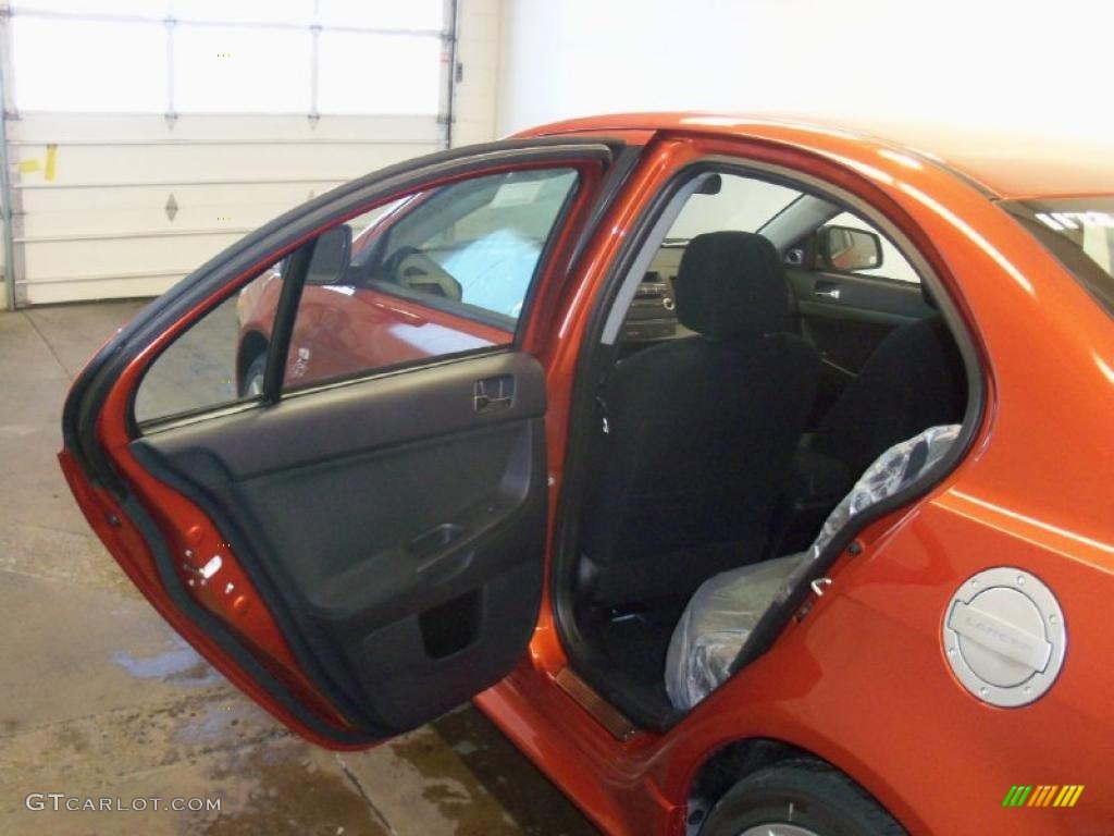 2010 Lancer GTS - Rotor Glow Orange Metallic / Black photo #17