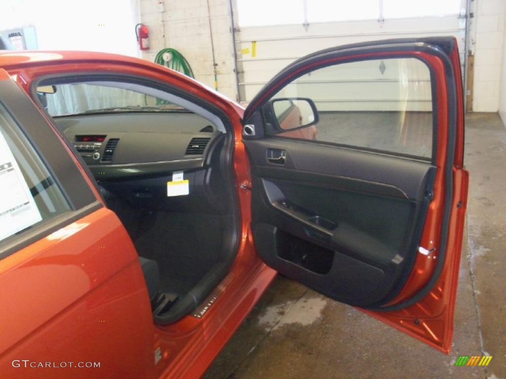 2010 Lancer GTS - Rotor Glow Orange Metallic / Black photo #23