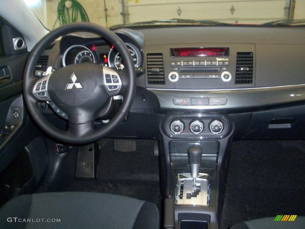 2010 Lancer GTS - Rotor Glow Orange Metallic / Black photo #25