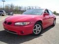 2000 Bright Red Pontiac Grand Prix GT Sedan  photo #1