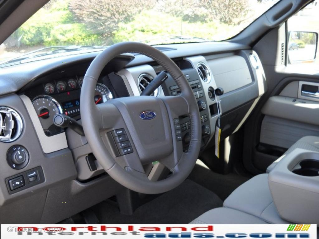 2010 F150 XLT SuperCab 4x4 - Dark Blue Pearl Metallic / Medium Stone photo #10