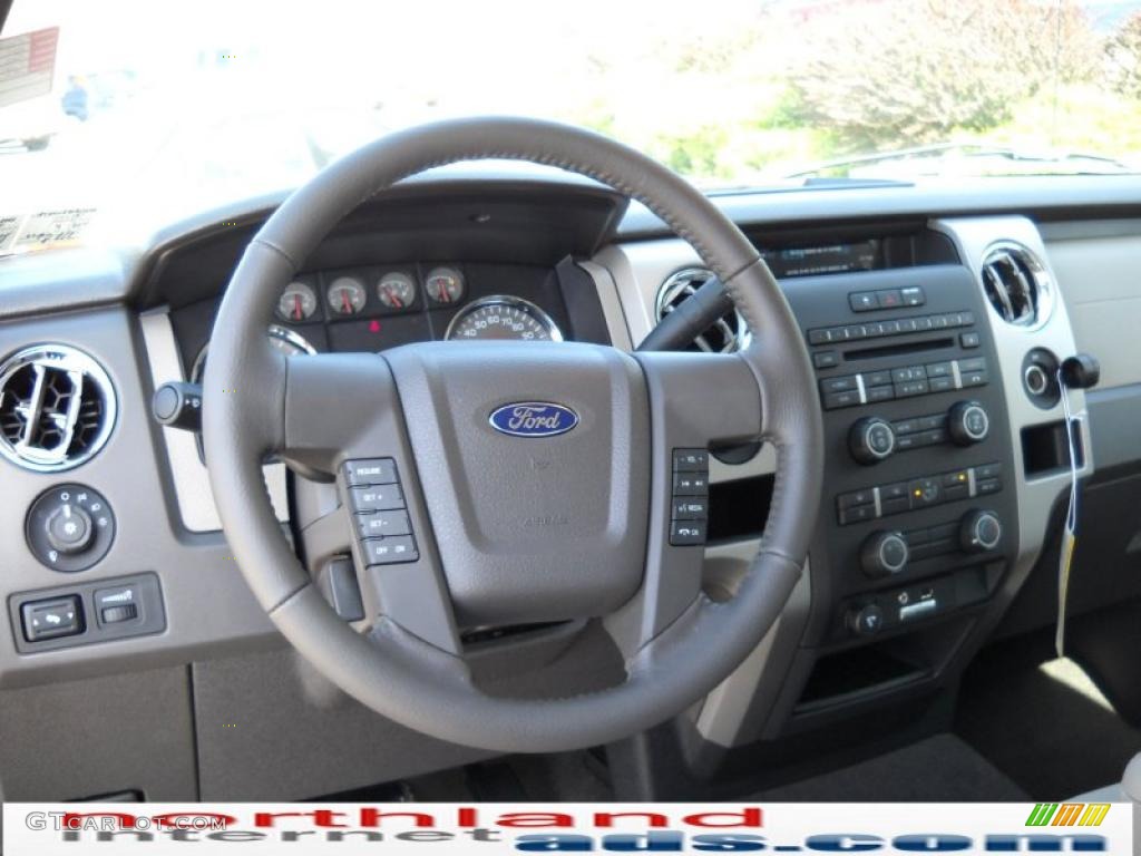2010 F150 XLT SuperCab 4x4 - Dark Blue Pearl Metallic / Medium Stone photo #14