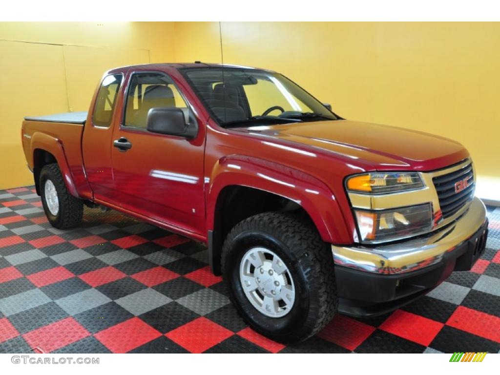 2006 Canyon SLE Extended Cab 4x4 - Cherry Red Metallic / Dark Pewter photo #1