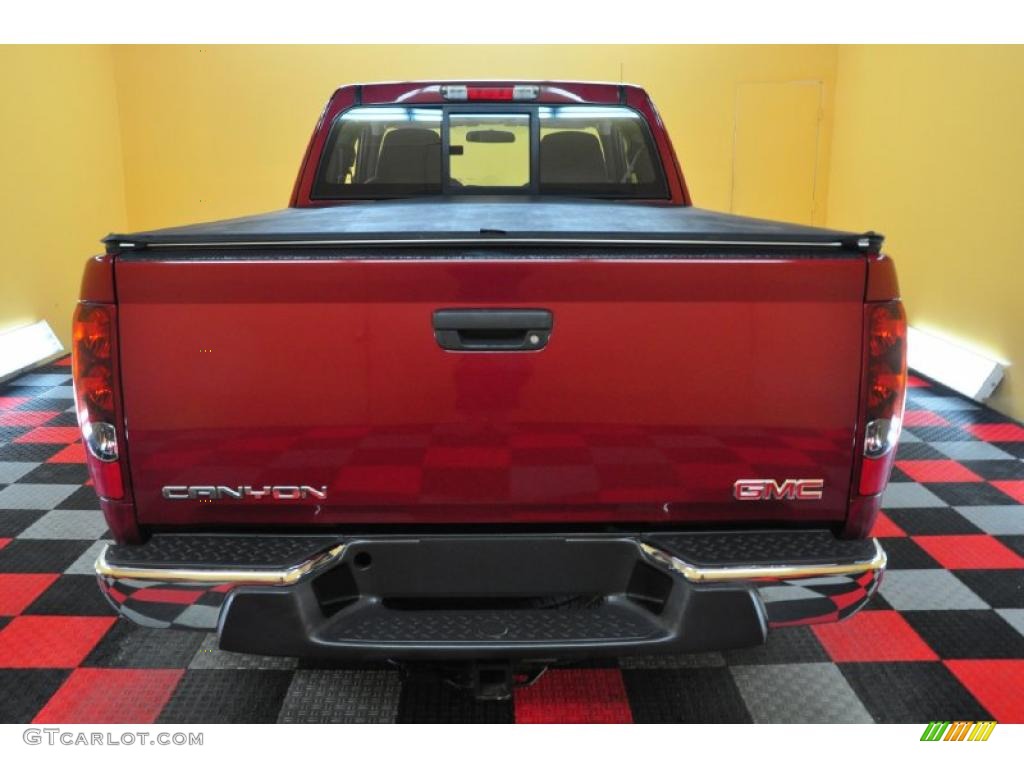 2006 Canyon SLE Extended Cab 4x4 - Cherry Red Metallic / Dark Pewter photo #5