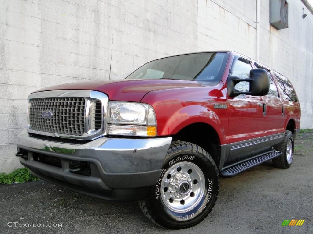 Red Fire Metallic Ford Excursion