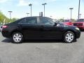 2009 Black Toyota Camry LE  photo #2