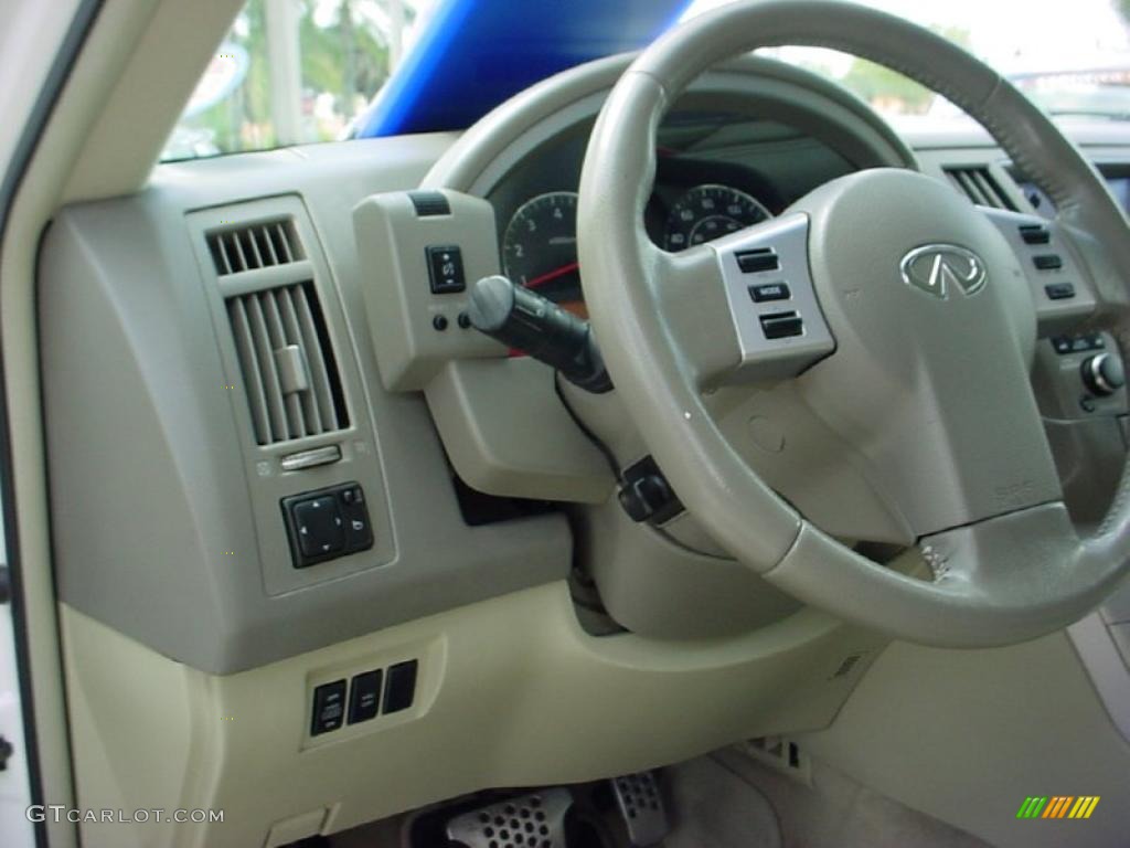 2003 FX 45 AWD - Ivory Pearl White / Willow photo #17