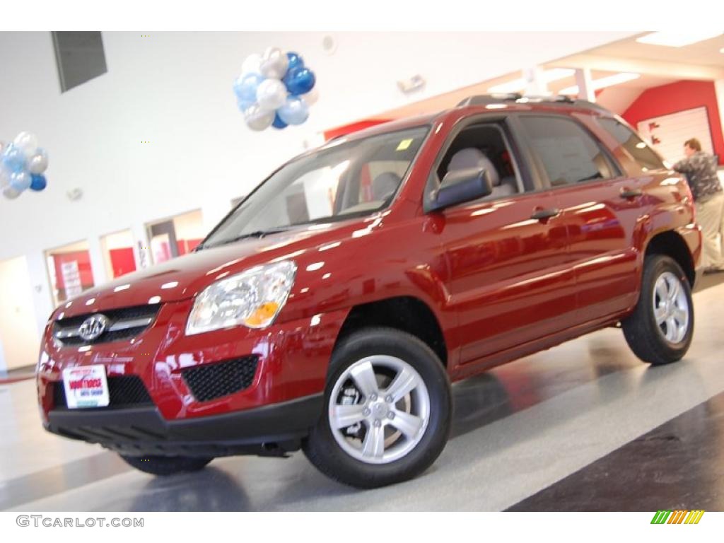 2010 Sportage LX - Volcanic Red / Beige photo #1