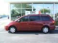 2009 Salsa Red Pearl Toyota Sienna LE  photo #3