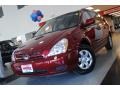 2010 Claret Red Kia Sedona LX  photo #2