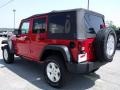 2010 Flame Red Jeep Wrangler Unlimited Sport 4x4  photo #6