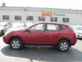 2009 Venom Red Nissan Rogue S AWD  photo #2