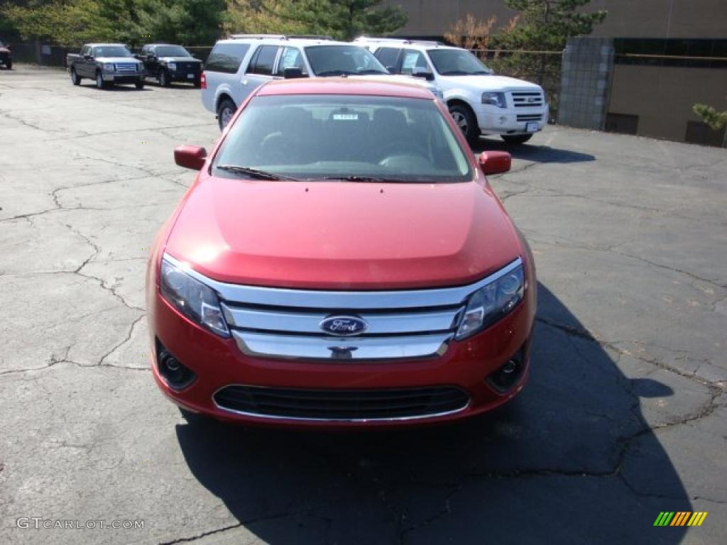 2010 Fusion SE - Red Candy Metallic / Charcoal Black photo #11