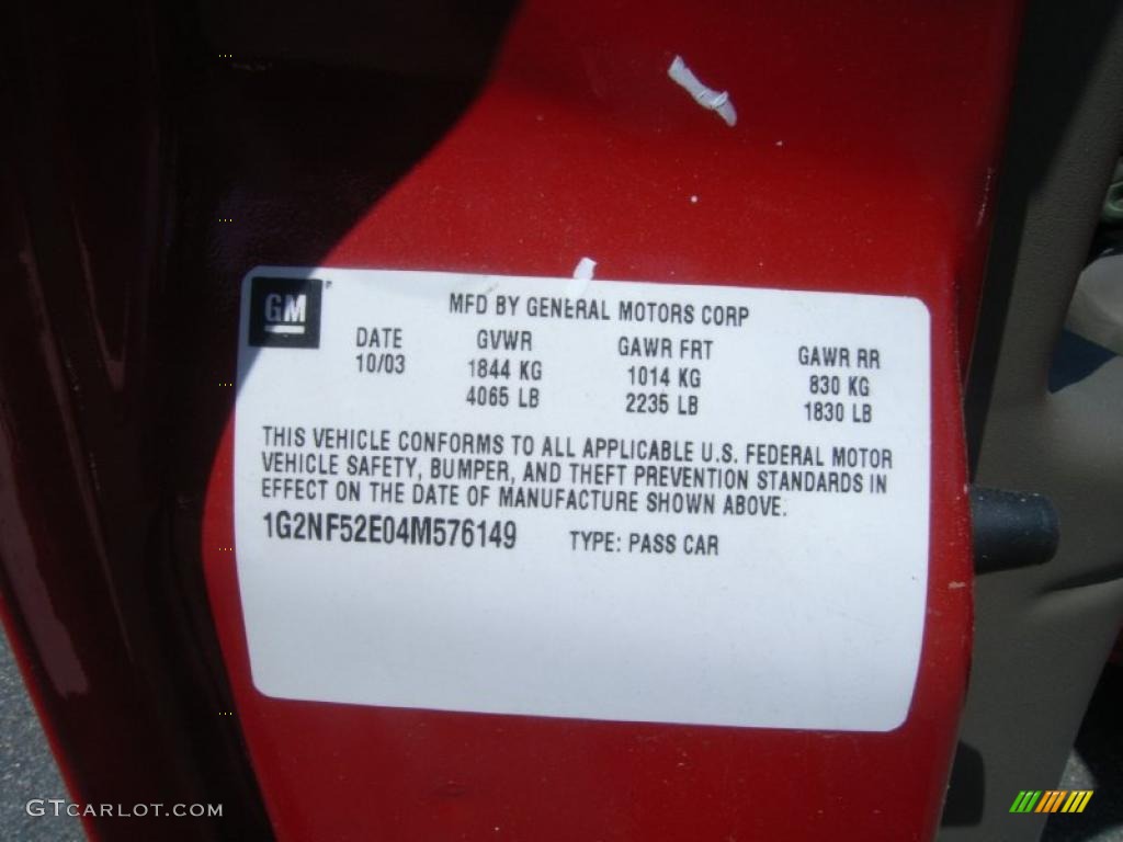2004 Grand Am SE Sedan - Sport Red Metallic / Dark Pewter photo #25