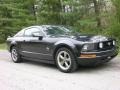 2006 Black Ford Mustang V6 Deluxe Coupe  photo #2