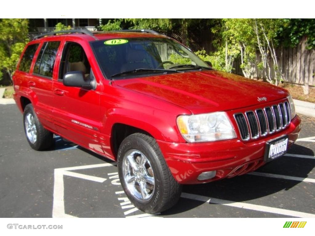 2002 Grand Cherokee Limited - Inferno Red Tinted Pearlcoat / Sandstone photo #1