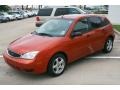 2005 Sangria Red Metallic Ford Focus ZX5 SES Hatchback  photo #3