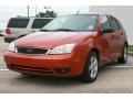2005 Sangria Red Metallic Ford Focus ZX5 SES Hatchback  photo #11