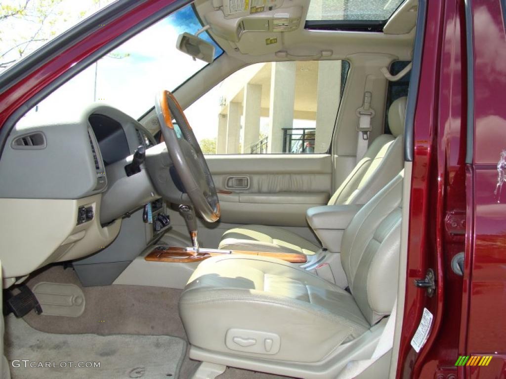 2002 QX4 4x4 - Royal Ruby Metallic / Stone Beige photo #4