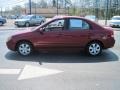 2009 Spicy Red Metallic Kia Spectra EX Sedan  photo #1