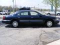 2001 Pearl Blue Metallic Lincoln Continental   photo #6