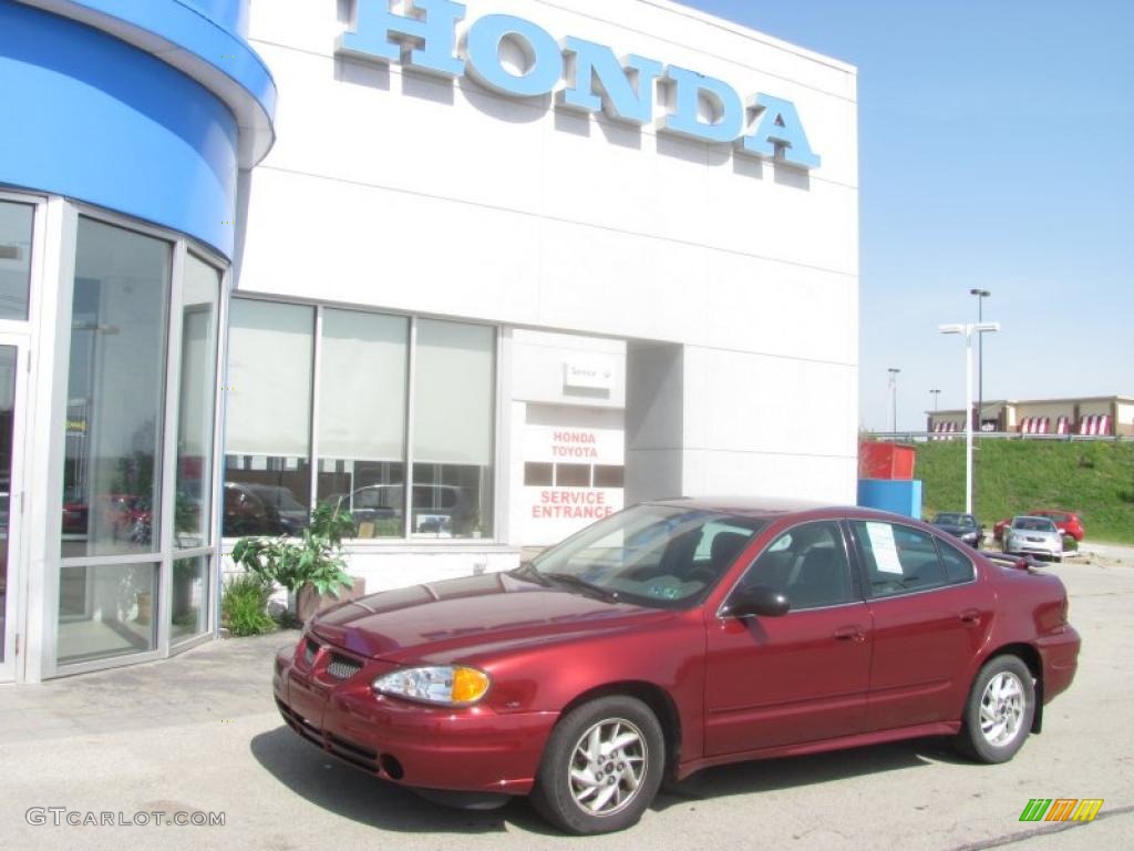 2003 Grand Am SE Sedan - Redfire Metallic / Dark Pewter photo #1