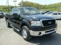 2006 Black Ford F150 XLT SuperCab 4x4  photo #1