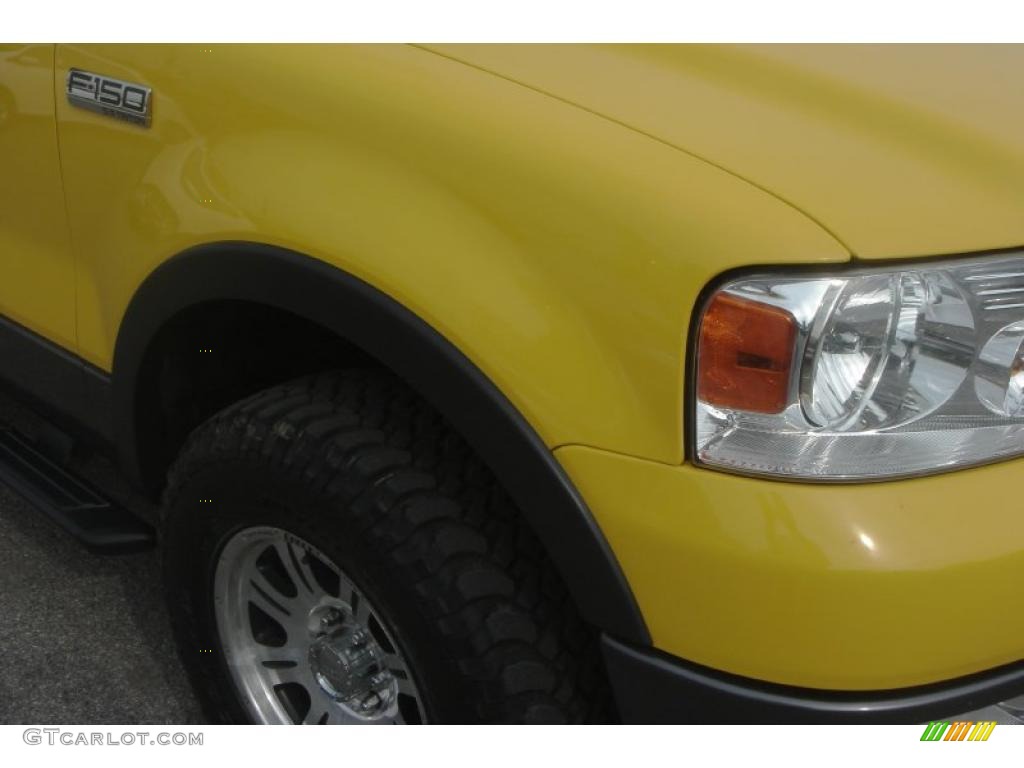 2004 F150 FX4 SuperCab 4x4 - Blazing Yellow / Black photo #18