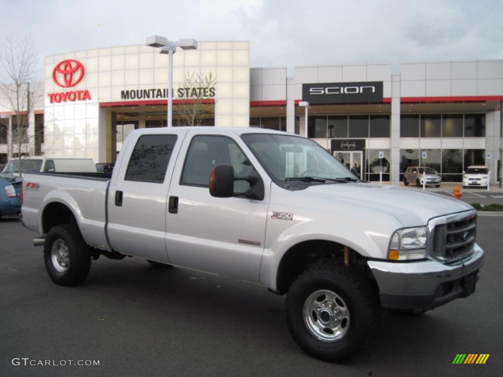 2004 F350 Super Duty Lariat Crew Cab 4x4 - Silver Metallic / Medium Flint photo #1