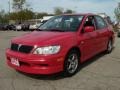 Phoenix Red 2003 Mitsubishi Lancer OZ Rally
