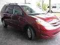 2009 Salsa Red Pearl Toyota Sienna LE  photo #6