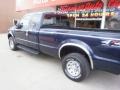 2002 True Blue Metallic Ford F250 Super Duty XLT SuperCab 4x4  photo #4