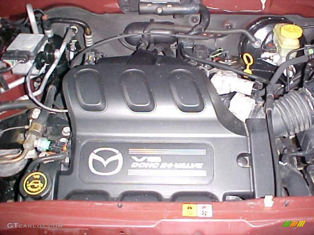 2001 Tribute LX V6 4WD - Chestnut Metallic / Beige photo #4