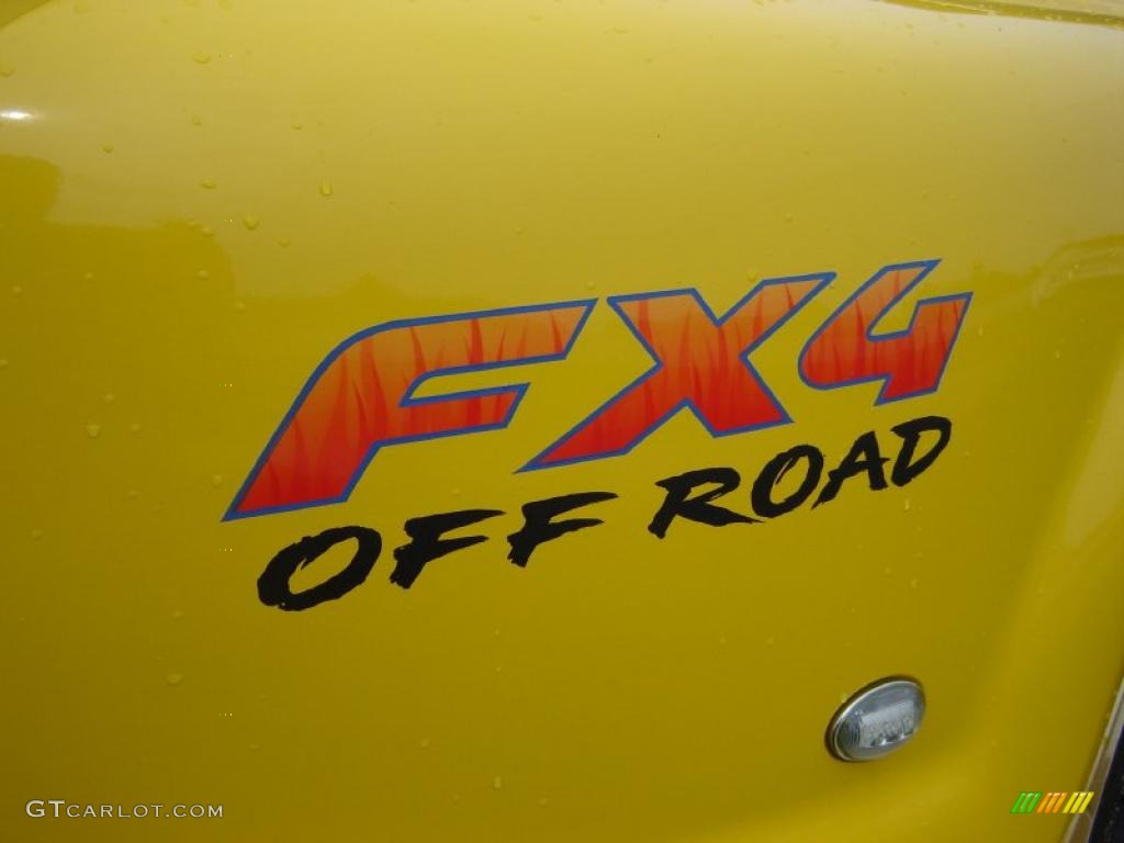 2006 F350 Super Duty Lariat Crew Cab 4x4 Dually - Blazing Yellow / Black photo #26