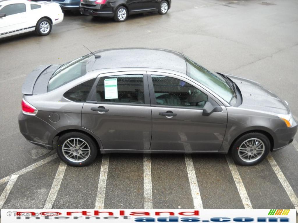 2010 Focus SE Sedan - Sterling Grey Metallic / Medium Stone photo #5