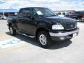 1999 Black Ford F150 XLT Extended Cab 4x4  photo #9