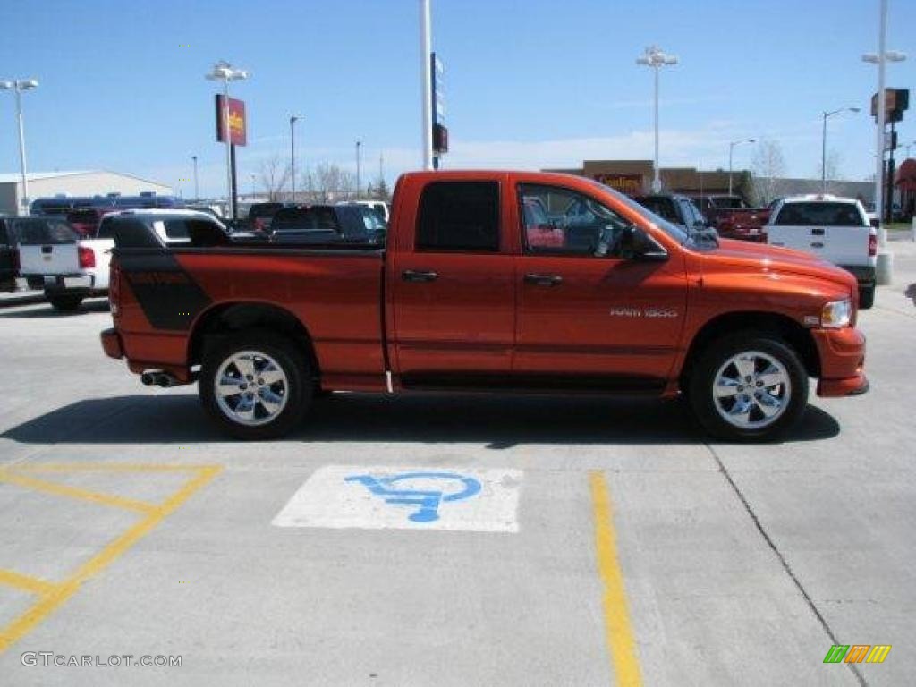 2005 Ram 1500 SLT Daytona Quad Cab 4x4 - Go ManGo! / Dark Slate Gray photo #12