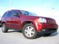 2008 Red Rock Crystal Pearl Jeep Grand Cherokee Laredo 4x4  photo #1