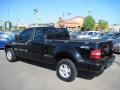 2005 Black Ford F150 STX SuperCab 4x4  photo #3