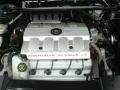 1999 Polo Green Cadillac DeVille Sedan  photo #22