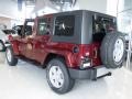 2010 Red Rock Crystal Pearl Jeep Wrangler Unlimited Sahara 4x4  photo #2