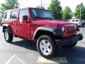 2010 Flame Red Jeep Wrangler Unlimited Sport 4x4  photo #4