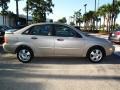 2006 Pueblo Gold Metallic Ford Focus ZX4 SES Sedan  photo #2