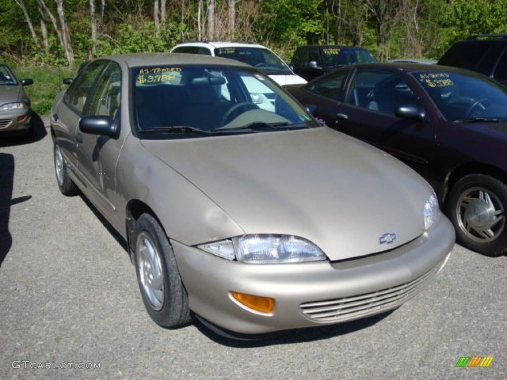 1999 Cavalier Sedan - Medium Sunset Gold Metallic / Neutral photo #1