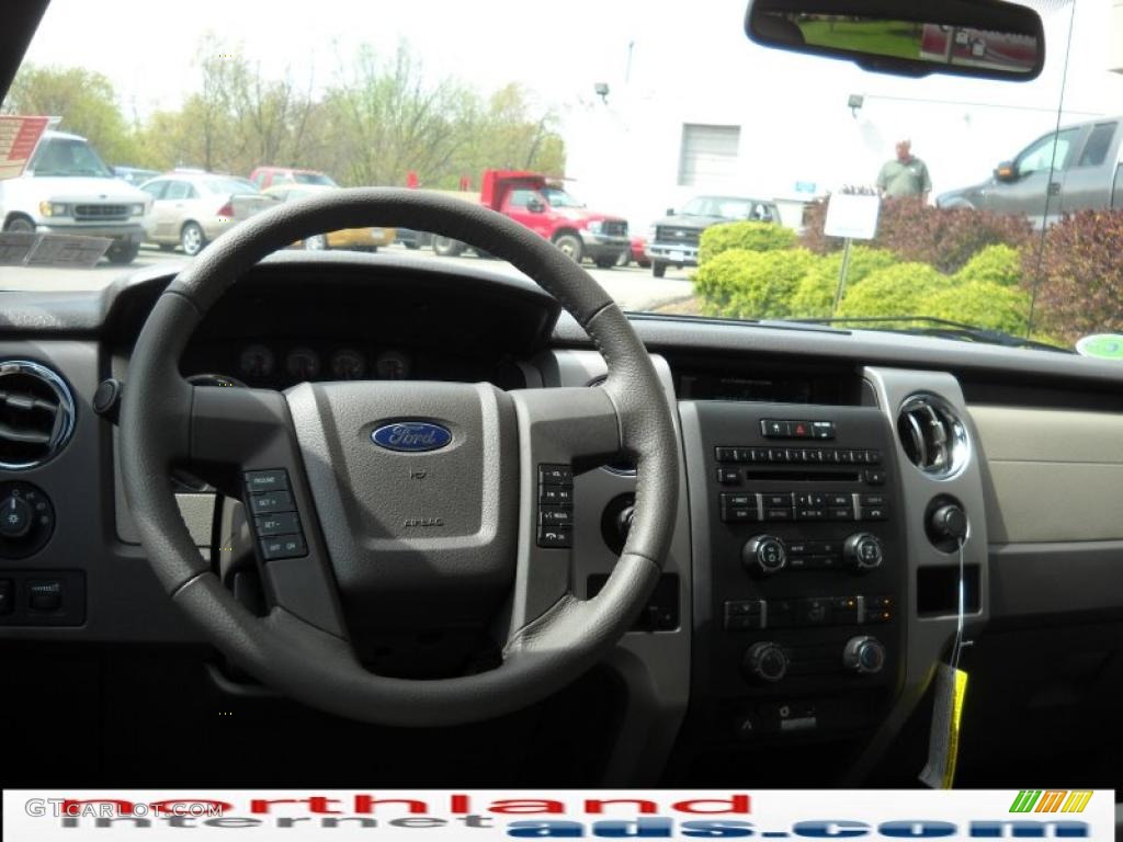 2010 F150 XLT SuperCrew 4x4 - Dark Blue Pearl Metallic / Medium Stone photo #14