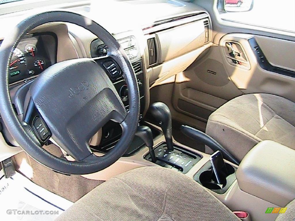 2000 Grand Cherokee Laredo 4x4 - Champagne Pearlcoat / Camel photo #33